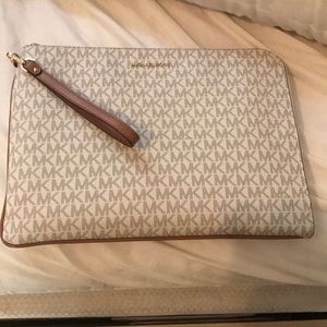 White micheal kors clutch / laptop tablet case
